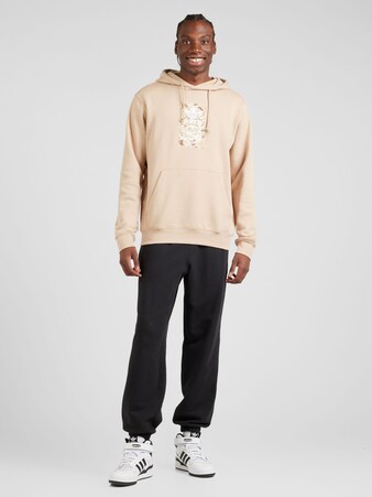 Sweatshirt in Beige & Schwarz